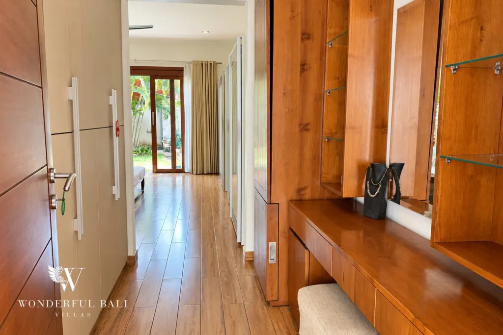 3BR villa for rent in Sanur — timber-floored hallway with built-in storage