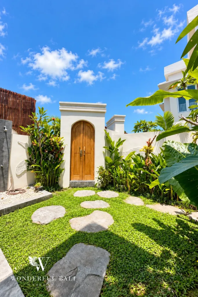 3BR villa for rent in Padonan — stepping-stone path to the garden door