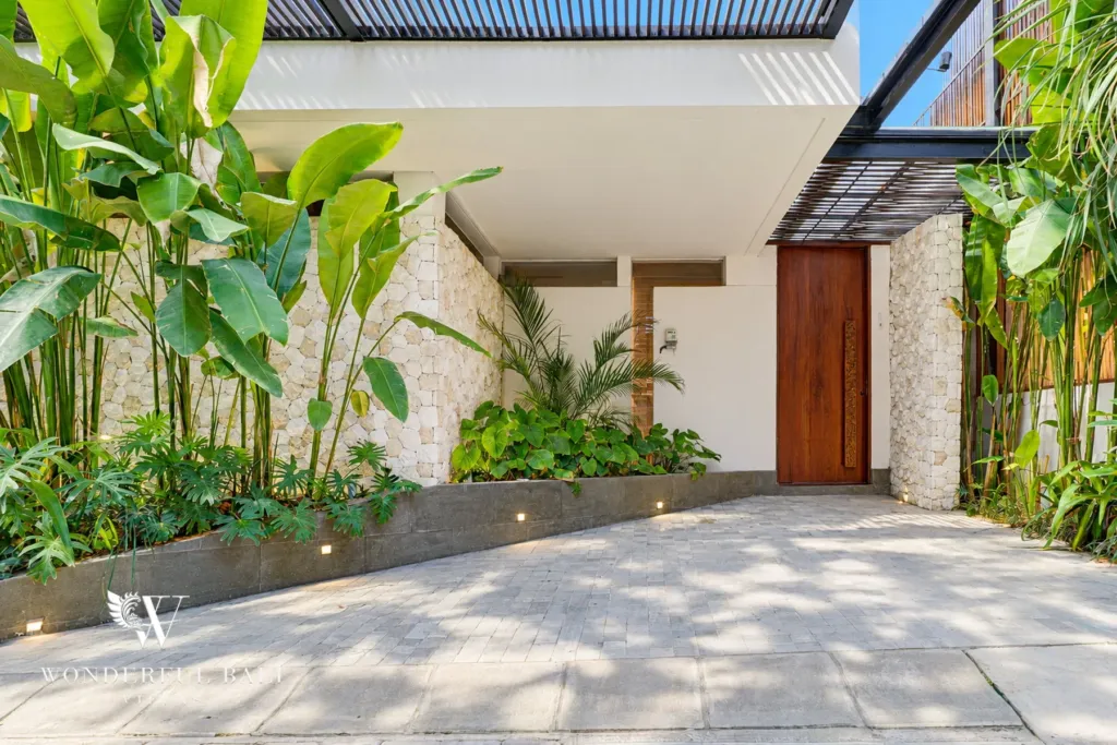 4BR villa for sale in Canggu — entrance with tropical planting