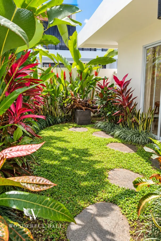 3BR villa for rent in Padonan — garden courtyard with red cordylines