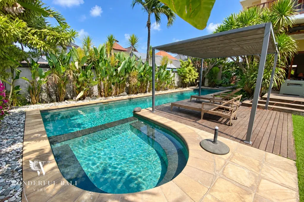 3BR villa for rent in Sanur — pool with timber deck and loungers