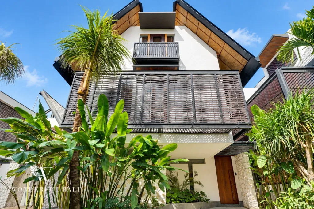 4BR villa for sale in Canggu — pitched-roof villa among palms
