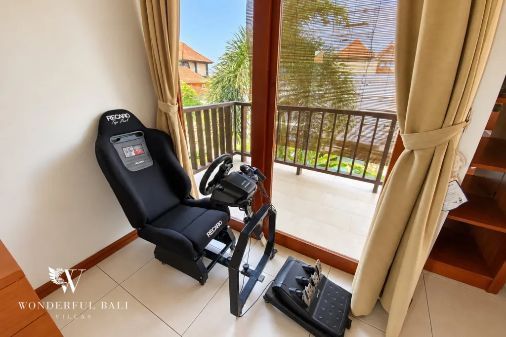 3BR villa for rent in Sanur — racing simulator corner by the balcony