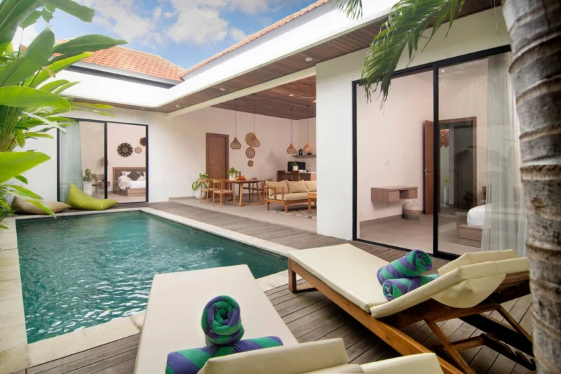 Relaxing at the pool with blue Bali sky.