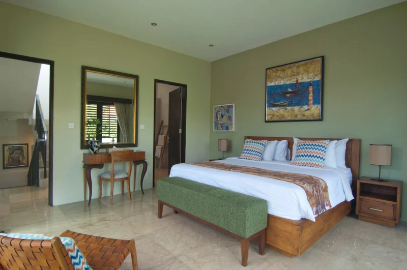 The bedroom with en-suite bathroom and beautiful arts.