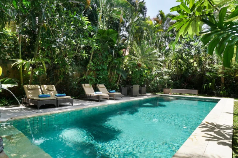 relax at the private pool in the spacious garden