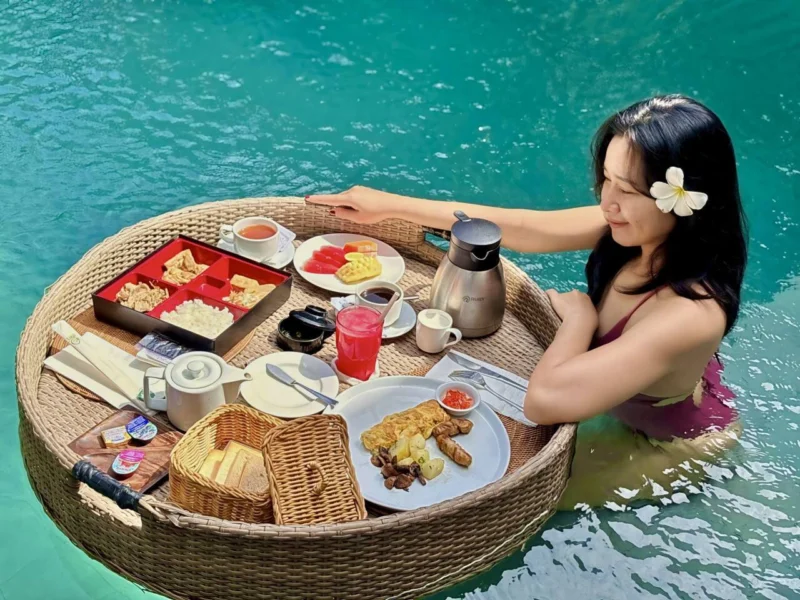 Breakfast in the pool — one of those Bali moments you don't plan, you just let happen. The kitchen is fully equipped, room service runs 7am to 10pm, and Seminyak's best cafés are a five-minute walk. But sometimes the right answer is a floating tray and no